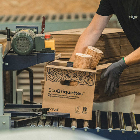 A box of ECOFUEL EcoBriquettes being packed on the conveyer belt 